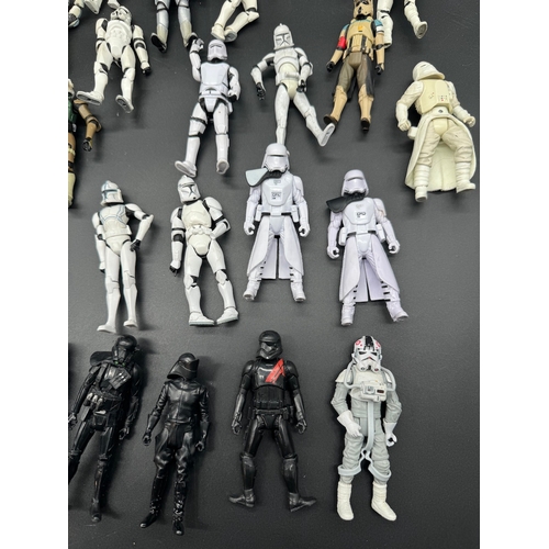 495 - A quantity of Star Wars Storm Trooper / Clone / Tie Fighter Action Figures from last 20 years