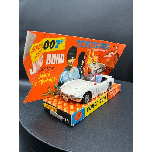 142 - Corgi Toys 336 James Bond Toyota 2000GT - In original box and plinth / card protectors, instructions