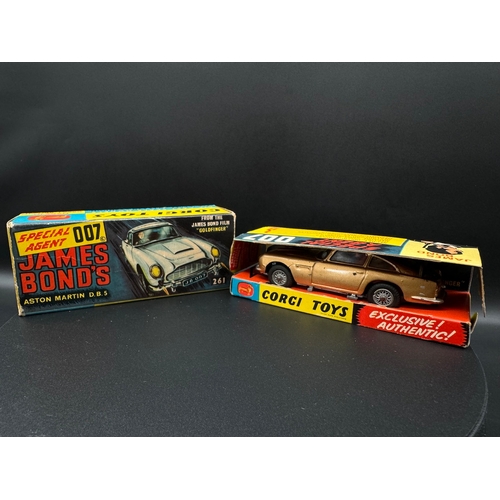 143 - Corgi Toys 261 James Bond Aston Martin D.B.5 in original box, plinth & instructions