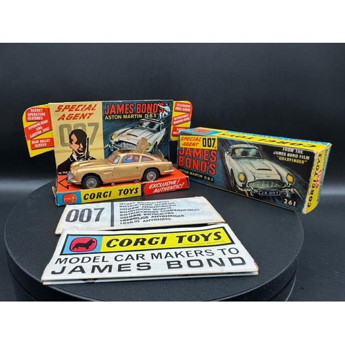 143 - Corgi Toys 261 James Bond Aston Martin D.B.5 in original box, plinth & instructions