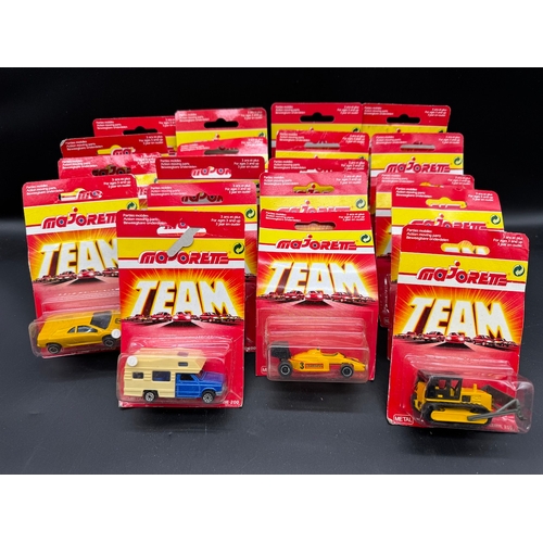 164 - A collection of 23 Majorette Team Serie 200 Diecast Model Cars / Vehicles all carded