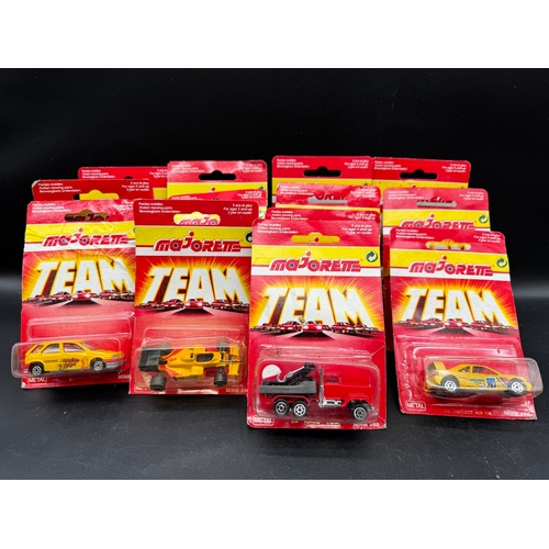 164 - A collection of 23 Majorette Team Serie 200 Diecast Model Cars / Vehicles all carded