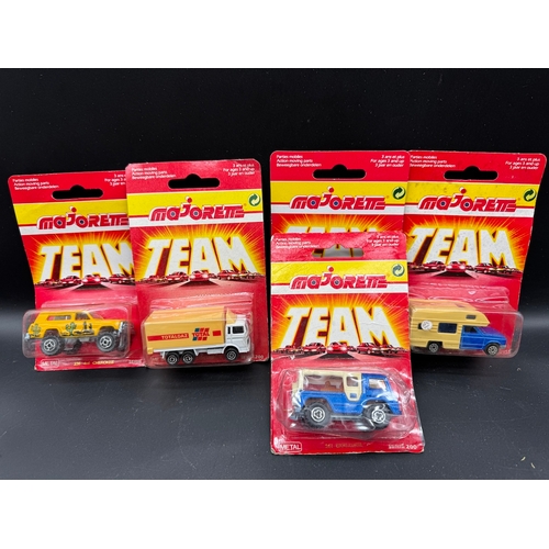 164 - A collection of 23 Majorette Team Serie 200 Diecast Model Cars / Vehicles all carded