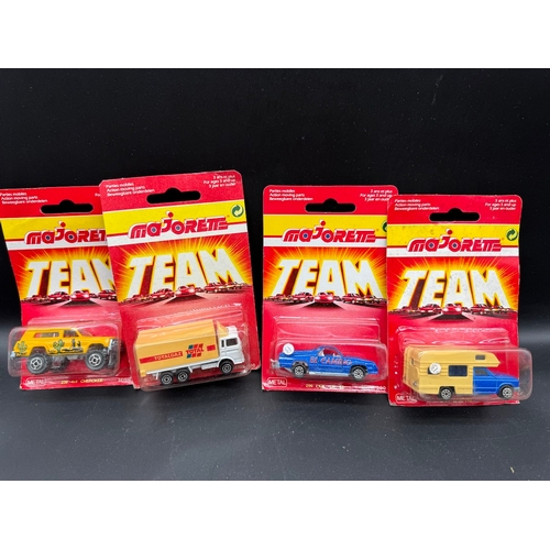 164 - A collection of 23 Majorette Team Serie 200 Diecast Model Cars / Vehicles all carded