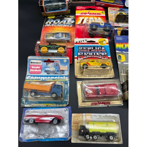 166 - A collection of 1970 / 80's diecast model Super Wheels, Majorette, Road Machines, ERTL + others all ... 