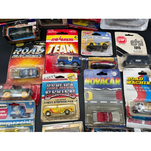 166 - A collection of 1970 / 80's diecast model Super Wheels, Majorette, Road Machines, ERTL + others all ... 