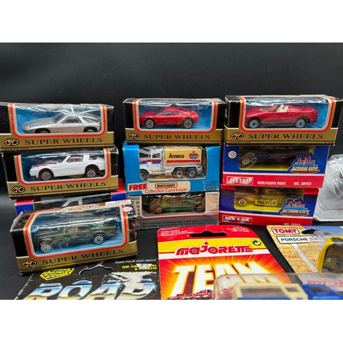 166 - A collection of 1970 / 80's diecast model Super Wheels, Majorette, Road Machines, ERTL + others all ... 