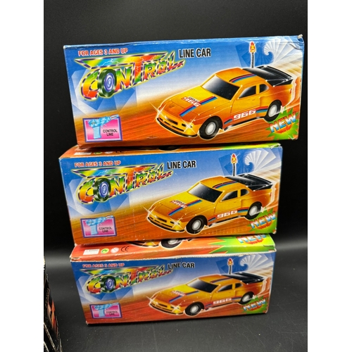 169 - A collection of boxed toy / models cars