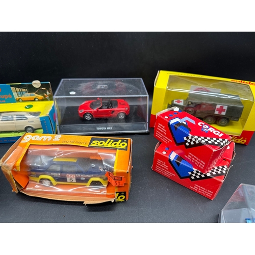 172 - A collection of Solido, Corgi, Minimod, Onyx + other model cars, buses & vehicles all boxed / cased