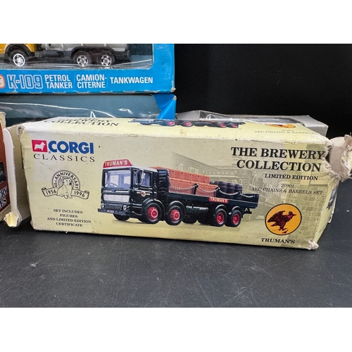 214 - A collection of Corgi, Matchbox, Tekno, AHL, + other Heavy Hauler / Tanker Die cast models all boxed