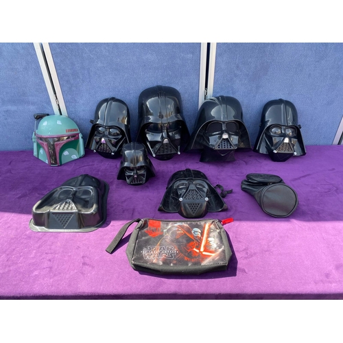 520 - A collection of Star Wars Darth Vader / Boba Fett Face masks + bags