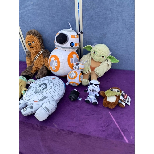 531 - A collection of Star Wars plushies / teddies