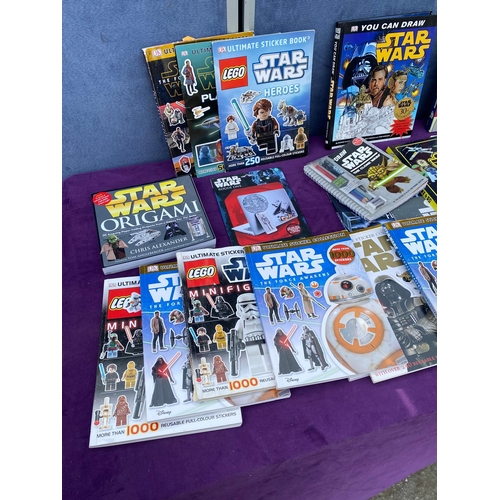 542 - A collection of Star Wars Sticker / colouring / reference books + others