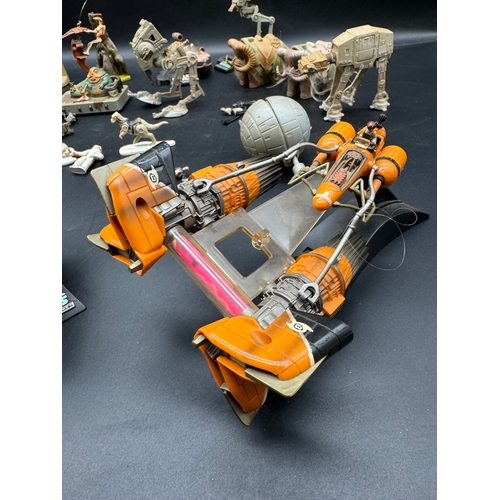 559 - A collection of Star Wars Action Fleet Models & figures