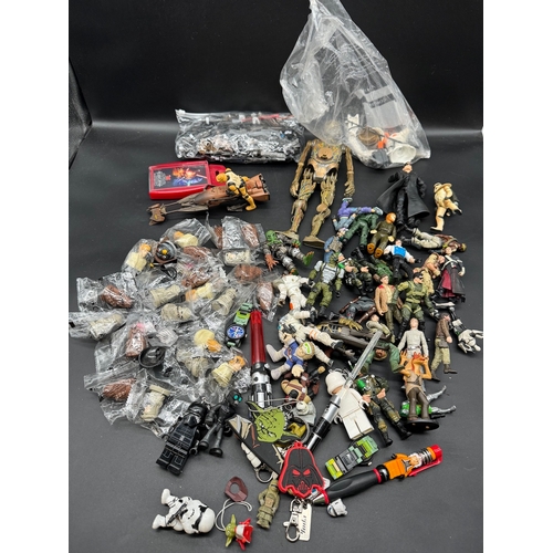 560 - A collection of Star Wars Stampers, action figures, action figure accessories + others  some from 19... 