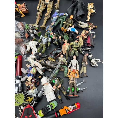 560 - A collection of Star Wars Stampers, action figures, action figure accessories + others  some from 19... 