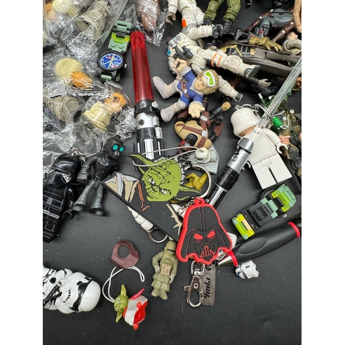 560 - A collection of Star Wars Stampers, action figures, action figure accessories + others  some from 19... 