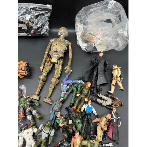 560 - A collection of Star Wars Stampers, action figures, action figure accessories + others  some from 19... 