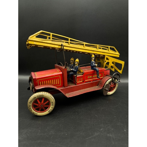 252 - A Distler tinplate clockwork Fire Engine J.D.1614 + Fire Station , German circa 1930 -  lithographed... 