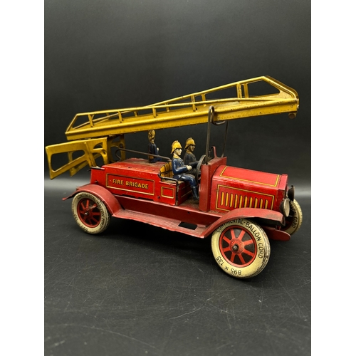 252 - A Distler tinplate clockwork Fire Engine J.D.1614 + Fire Station , German circa 1930 -  lithographed... 