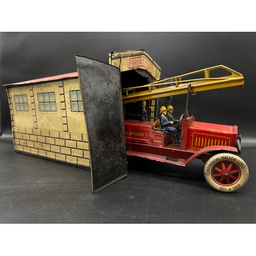 252 - A Distler tinplate clockwork Fire Engine J.D.1614 + Fire Station , German circa 1930 -  lithographed... 