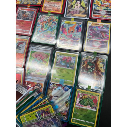 111 - Collection of 58 Holographic Pokemon Cards from various sets + 1 Topps Charizard, Ninetales Holo Bas... 