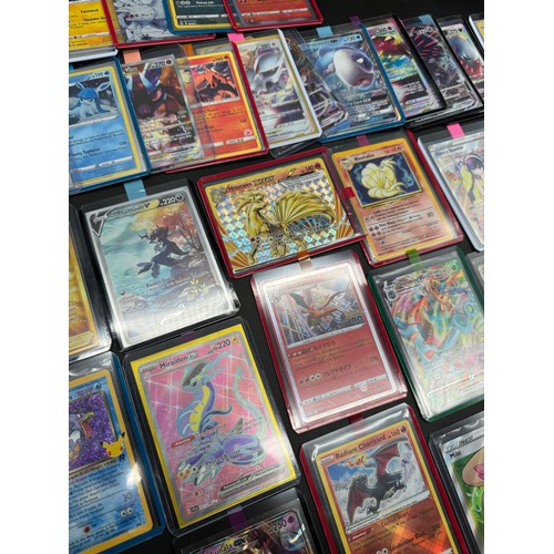 111 - Collection of 58 Holographic Pokemon Cards from various sets + 1 Topps Charizard, Ninetales Holo Bas... 