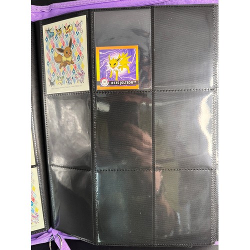 105 - Pokemon Album containing Eevee & Evolvements - contains Holo cards from last 20 years including Foss... 