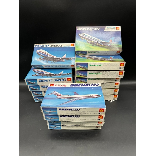 236 - A collection of 14 Crown Japan Model Boeing 747 Jumbo Jet Plastic Moulded Kits Complete