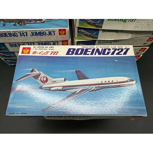 236 - A collection of 14 Crown Japan Model Boeing 747 Jumbo Jet Plastic Moulded Kits Complete