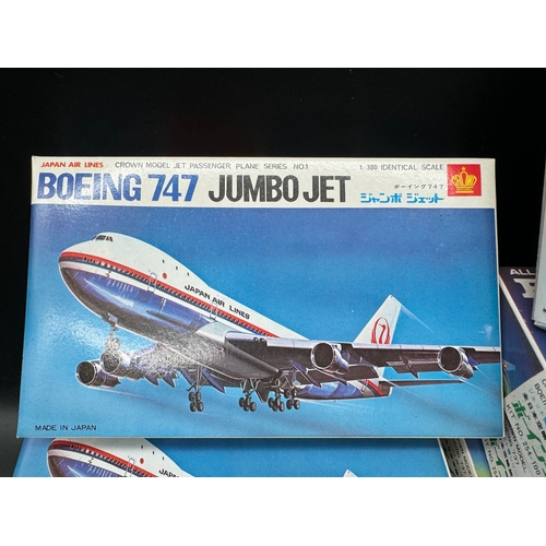 236 - A collection of 14 Crown Japan Model Boeing 747 Jumbo Jet Plastic Moulded Kits Complete