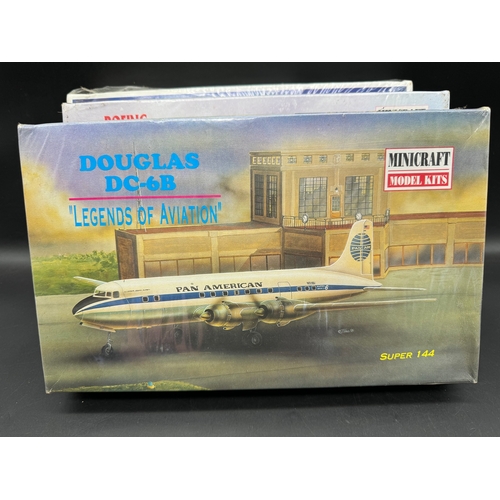 239 - Four Sealed Minicraft Aircraft Plastic Moulded Kits Boeing 737-300 / Douglas DC-6R, Space Shuttle 7 ... 