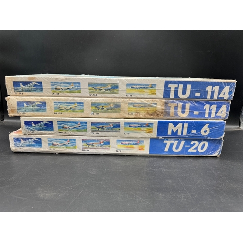 241 - Four Sealed VEB Plasticart Moulded Plastic Model Aircraft Kits including TU114 / MI6 / TU20