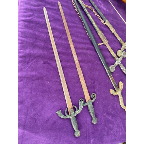 106 - A selection of decorative swords / daggers