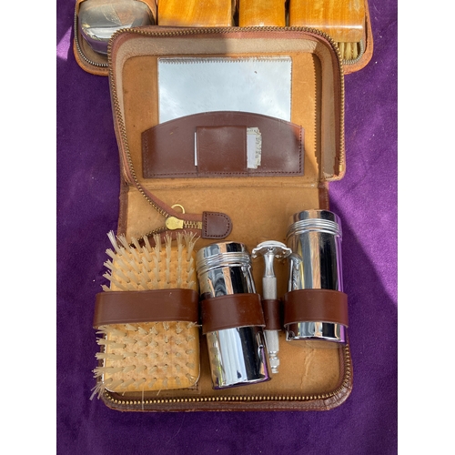 109 - Two retro vanity / grooming sets.