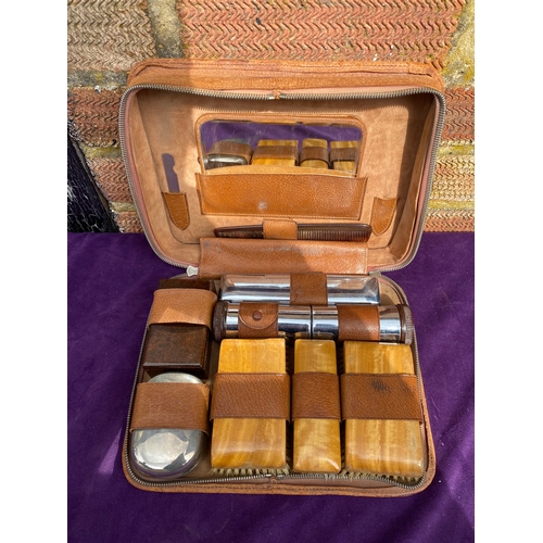 109 - Two retro vanity / grooming sets.