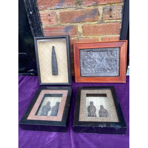 114 - Framed stone relief art pieces.