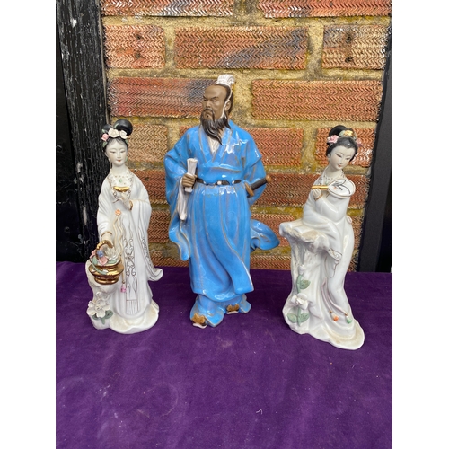 116 - A collection of oriental inspired ceramic figures