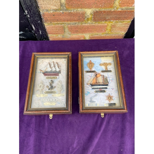 129 - Two Naval themed framed key storage boxes.