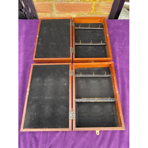 129 - Two Naval themed framed key storage boxes.