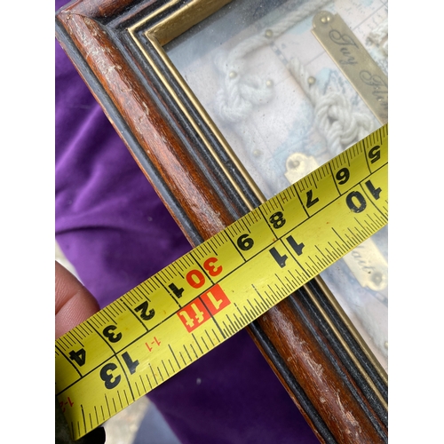 129 - Two Naval themed framed key storage boxes.