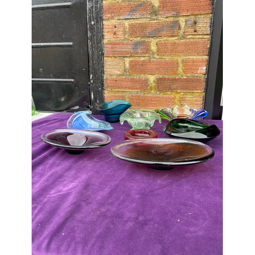 133 - A collection of coloured glass bowls/trays.