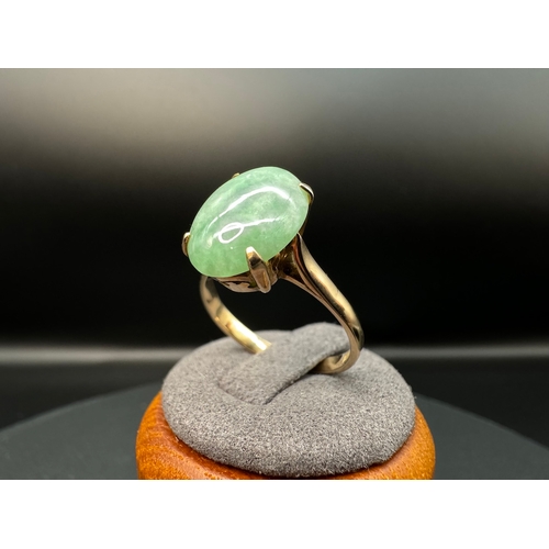 1 - 14ct Yellow Gold Oval Cabochon Jade Ring
Size S
Weight 4.4g