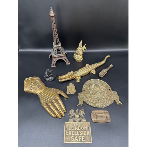 55 - Collection of vintage brass collectables including antique safe plaques