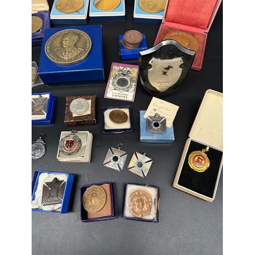 56 - Collection of metal and bronze athletics medallions including Jean Giraudoux 1944 bronze medallion c... 