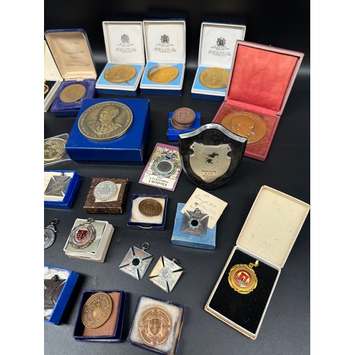 56 - Collection of metal and bronze athletics medallions including Jean Giraudoux 1944 bronze medallion c... 