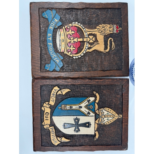 68 - Two carved wooden coat of arms plaques,  19th century blue & white candlestick holder, Fulham Potter... 