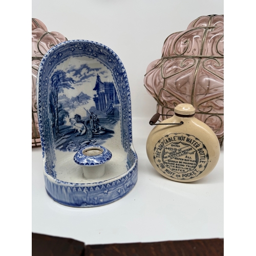 68 - Two carved wooden coat of arms plaques,  19th century blue & white candlestick holder, Fulham Potter... 