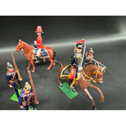 292 - Britains Hollow cast various regiments + mounted officers Naval Riflemen