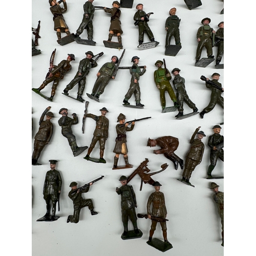 313 - Large quantity of Britains Hollow Cast WW1 & WW2 Infantry, Officers , accesories